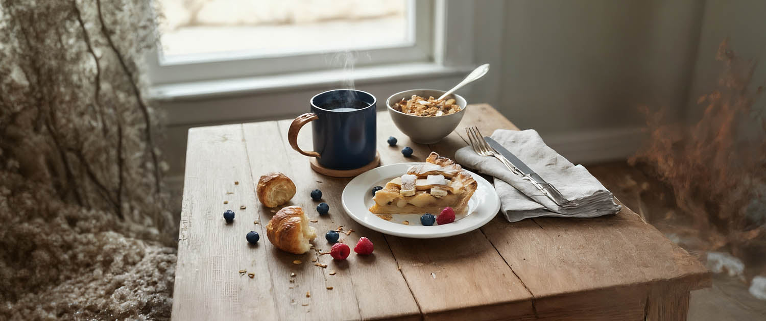 A table setting with Coffee, Pie, and Cereal. 